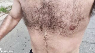 Naughty hairy guy training outdoors