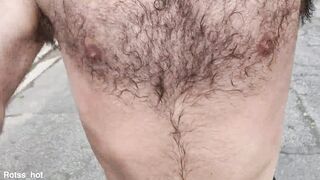 Naughty hairy guy training outdoors