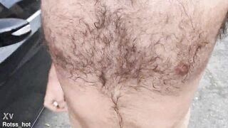 Naughty hairy guy training outdoors