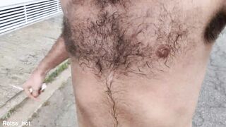 Naughty hairy guy training outdoors