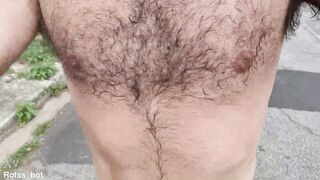 Naughty hairy guy training outdoors