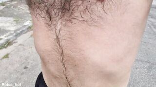 Naughty hairy guy training outdoors