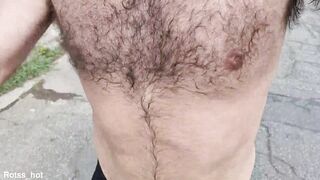 Naughty hairy guy training outdoors