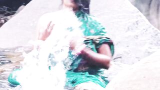 Villege aunty outdoor water fall bathing. Telugu dirty talks. - 1 image