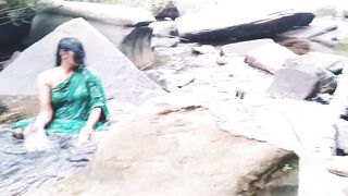 Villege aunty outdoor water fall bathing. Telugu dirty talks. - 2 image