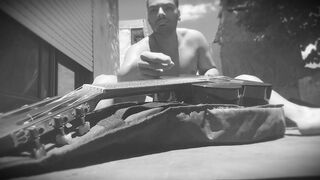 Big Men - Muscular Men - Outdoor - Sexy N1 - Rubbing a Chinese-made Yamaha C80 guitar on his 18cm penis