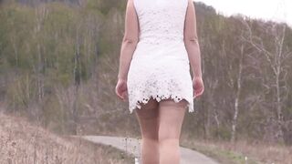Exhibitionism and fetish in public places outdoors. Big ass and hairy pussy are walking on the road. Compilation. - 10 image