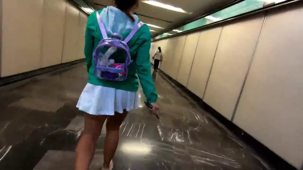 I walk around the city in the subway, parks and supermarket, with a transparent skirt image