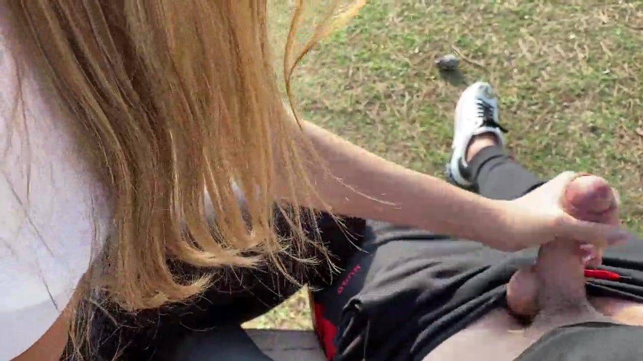 Public Handjob with cumshot in my Mouth in open Park where people walk by us watch online image