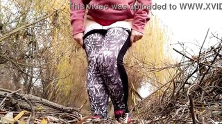 Curvy MILF with fat belly in leggings pissing outdoors - 8 image