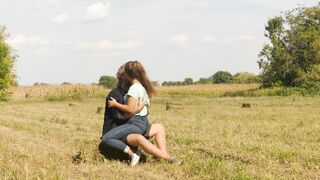 Beautiful Teen Couple in Love Passionately Kissing on the field - 12 image