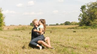 Beautiful Teen Couple in Love Passionately Kissing on the field - 14 image