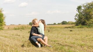 Beautiful Teen Couple in Love Passionately Kissing on the field - 3 image